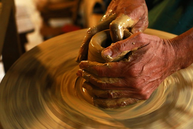 close-up of handmade ceramic glaze in soft beige and clay tones with natural light